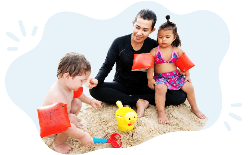 slide-3-beach-play thai nanny playing on the beach with children